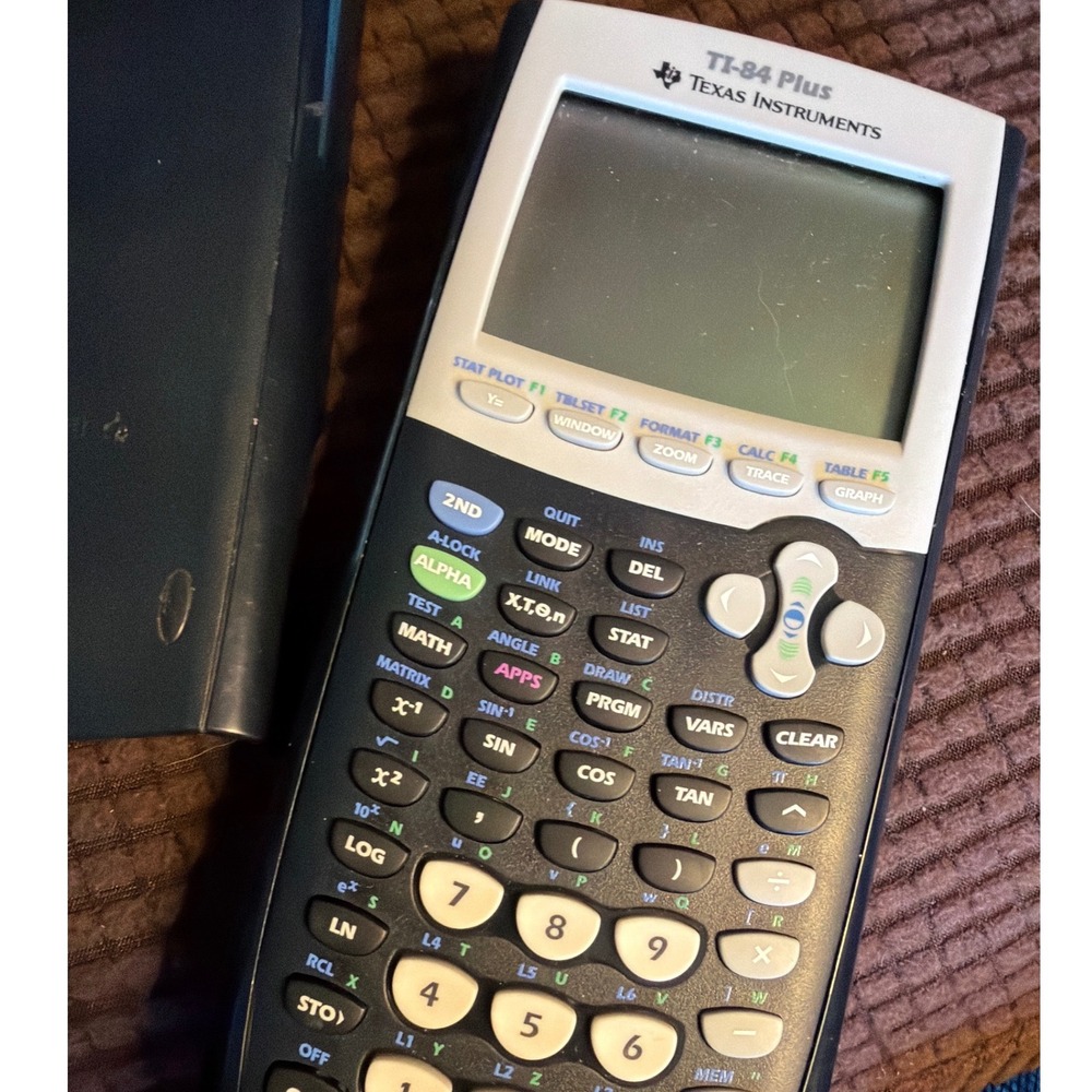 Texas Instruments TI-84 Plus Graphing Calculator Black Silver Student Math Tech